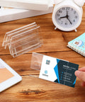 Set Of 30 Mini Acrylic Sign Holders, 2 X 3.5 Inch Clear Desk Name Plates, Horizontal V Shaped Displays For Office, hand placing card