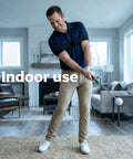 Man using Retractable Golf Swing Trainer With Click Feedback Posture Correction Arm Band And Grip Trainer indoors