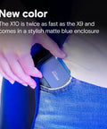 Person inserting X10 4TB Portable SSD With Up To 2100 MBps Read Speeds USB 3.2 Gen 2 Type C External Solid State Drive into pocket