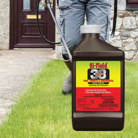 Man spraying 38 Plus Turf Termite And Ornamental Insect Control Outdoor Lawn Barrier Spray 32 oz 38 Percent Permethrin in yard