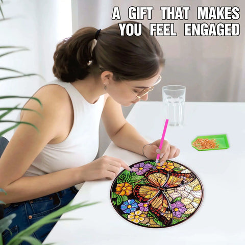 Woman using Dual Sided Diamond Art Hanging Kit For Adults With Butterfly Crystal Ornaments Flower Sun Catchers on table.