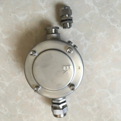 Explosion-proof junction box, round 316 stainless steel, front view with NPT cable glands
