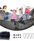 Kids playing on Climbing Net For Kids Double Layer Heavy Duty Backyard Playground Safety Net 9.9 Feet By 9.9 Feet