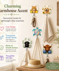 4 Pack Butterfly Adhesive Wall Hooks Featuring Real Pretty Floral Garden Motifs Super Strong Peel And Stick Acrylic Hooks For Worry Free Counter Organization And A Super Cozy Living Space Vibe with various designs holding keys and a towel.