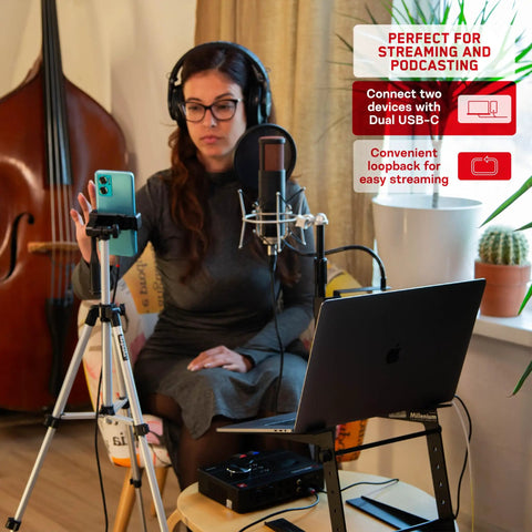 Zen Quadro USB-C Podcast Interface With Four Studio-Grade Mic Preamps, set up with laptop and microphone in a home studio.