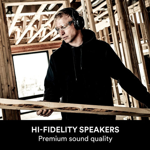 Person wearing Wireless Hearing Protector With Bluetooth, Gel Cushions, NRR 23 dB, Dope Sound from High Fidelity Speakers in workshop.