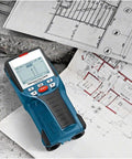 Nail Your Next Home Project Straight Up With This Hella Reliable Wall Scanner And Metal Detector featuring blue device on renovation plans.