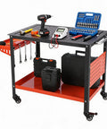 Professional Industrial Welding Table 36 By 24 Inches Beefed Up Steel Workbench with tools on top and pegboard hooks.