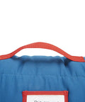 Close-up of Team Spirit Nap Mat Set With Built In Pillow And Plush Blanket All In One Portable Nap Gear handle in red and blue