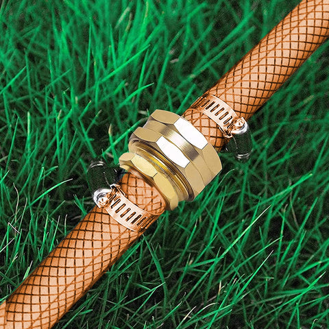 5/8 Inch Aluminum Garden Hose Repair Kit on hose with stainless steel clamps, visible on grass, leak-proof connection