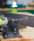 8-32 NC Do It All Combination Drill Tap Countersink Bit in use on a metal sheet with quick change hex shank