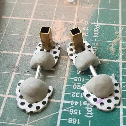 Beginner Stop Motion Metal Kit For Animators With Brass Square Tubes In Three Sizes One Eighth Inch Five Thirty Second Inch And Three Sixteenth Inch Twelve Inch Lengths Made In USA brass tube armature parts on cutting mat
