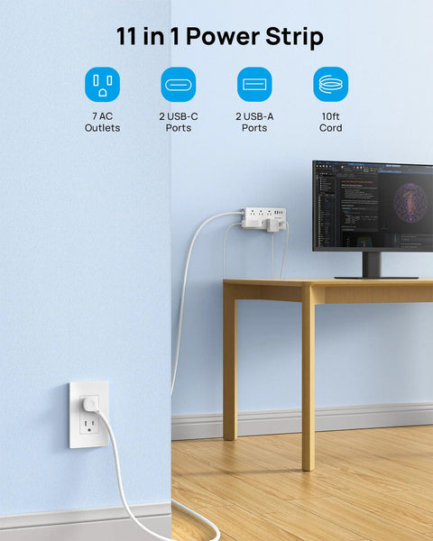 Game Changer Surge Protector Power Strip With 10 Foot Flat Plug Extension Cord on wall, powering a computer setup.