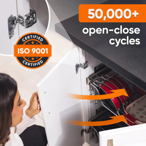 Person examining Soft Close Cabinet Hinges 30 Pack One And A Half Inch Overlay Concealed Hidden Hinges on open cabinet.