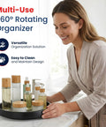 Person using 10 Inch Lazy Susan Turntable Set Of 4 Non Skid Cabinet Organizer holding bottles on bathroom counter