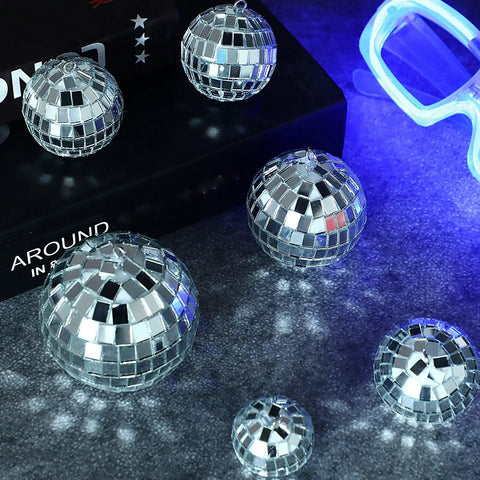 20 Piece Mini Mirror Disco Balls Set With Rope Assorted Silver Reflective Party Decor, sizes 1.2 to 2.4 inches on display