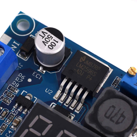 Close-up of a Dope LED Display Voltmeter Buck Converter With 4.0-40V Input To 1.25-37V Adjustable Output 2A DC-DC Step-Down Power Supply
