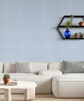 Living room featuring Light Blue Faux Grasscloth Peel And Stick Wallpaper 15.7x120 Inches Self Adhesive Contact Paper with textured fabric look.