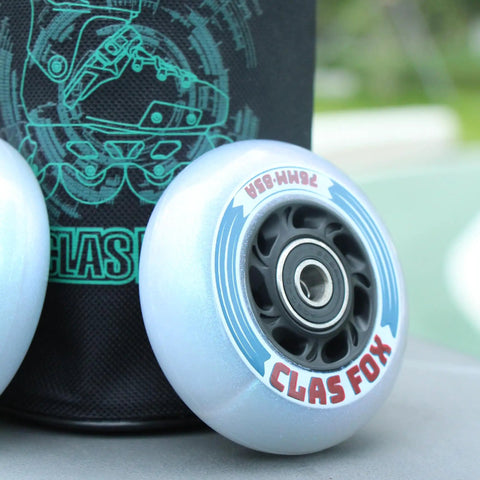 Close-up of blue inline skate replacement wheel with ABEC 9 bearing and 85A hardness on a skate-themed backdrop