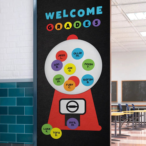 Classroom bulletin board with gumball machine design, displaying student names in colorful circles and 'Welcome Grade 5' text.
