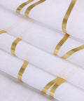 Close-up of white and gold see through sheer curtains with elegant wave pattern, designed for living room, 90 inch long, grommet top.
