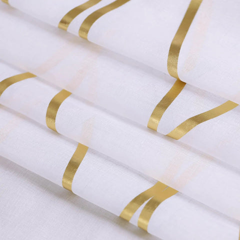 Close-up of white and gold see through sheer curtains with elegant wave pattern, designed for living room, 90 inch long, grommet top.