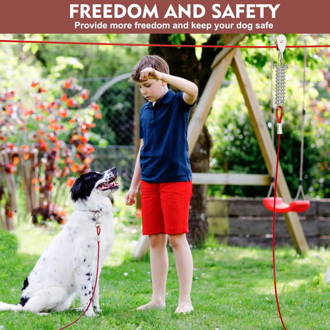 Boy with dog using Heavy Duty 200 Ft Dog Runner With 10 Ft Tie Out Cable For Big Dogs Up To 250 Lbs Safe Zip Line