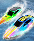 Two Pack RC Boat Set For Pools And Lakes with RGB lights racing on water, featuring sleek design and vibrant colors.