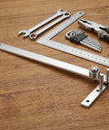 Super Tough Manual Rebar Bender Mini Tubing Wire Bending Tool Crafted From Durable Steel For Precise Rod Shaping With Ergonomic Leverage Handle on wooden surface with other tools.