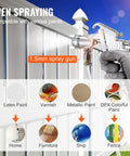 No Sweat Automatic Stirring Spray Paint Pressure Pot Two Point Five Gallon Air Powered Paint Mixer Tank With Adjustable Seventy Psi Output Includes Complete Sprayer Gun And Hose Kit For Smooth Home And Industrial Finishes showing 1.5mm spray gun spraying paint on a fence.