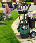 Heavy Duty Rolling Garden Cart With 5 Gallon Bucket, Oxford Bag With 8 Pouches, And 3 Gallon Basket on garden path