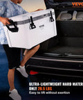 Man loading Ultra Light Hard Cooler 52 Qt With Heavy Duty Handle Keeps Ice For Up To Six Days into car trunk, 30 Percent Lighter