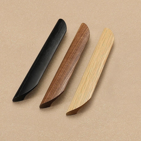 Three oblique angle cabinet door handles in different finishes, featuring oak wood, including the Oak Wood Oblique Angle 4.41 Inch Windbreaker Cabinet Door Handle In Antique Long Walnut Finish, Versatile Pull For Cabinets And Drawers, Suitable For Kitchen, Living Room, Dining Room, And Bedroom Decor, Set Of 2