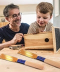 Kickass Six Inch Japanese Pull Saw Featuring Double Edged Design With Fourteen Teeth Rip Side And Seventeen Teeth Cross Cut Blades For Slick Precision Woodworking And Pro Grade Carpentry Projects in use by a father and son.