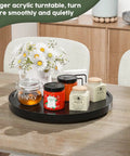 Your Go To Non Skid Bamboo Lazy Susan Turntable For Kitchen Countertops And Tables 13.2 Inch Wood Organizer In Black displaying jars