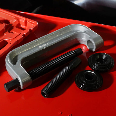 Heavy Duty Ball Joint Press Kit and Wheel Bearing Tool Set for Auto Suspension parts on red surface