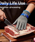 Person using Cut Resistant Chainmail Gloves With Stainless Steel Mesh, Ambidextrous Steel Glove And Nylon Liner Glove for meat cutting
