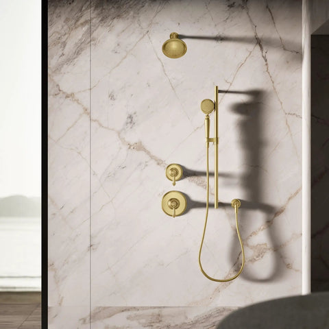 Artifacts Single-Function Handshower With 1.75 GPM Flow, Katalyst Air-Induction Technology Delivers A Powerful, Even Spray, Ergonomic Pivot Head For Targeted Hydromassage, Vibrant Brushed Moderne Brass Finish, Your Bath Upgrade, installed in a marble-tiled shower