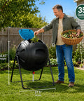 Man adding kitchen scraps to a Heavy Duty 35 Gallon Tumbling Compost Bin With Easy Drain Plug For Liquid Collection Rotating Outdoor Garden Waste Container Built To Last UV Protected Blue in a backyard