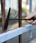 Tough As Nails Welding Chipping Hammer With Comfort Grip Spiral Handle and Anti Rust Tempered Steel Head in action removing rust.