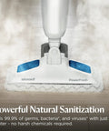 Heavy Duty Steam Mop With 12 Inch Sweeping Path For Hardwood And Tile Floors Featuring Built In Scrubber and Variable Steam Controls cleaning hardwood floors.