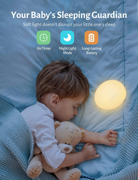 Sleeping baby with Rechargeable Egg Night Light For Baby And Kids With 7 Colors Changing Mode Stepless Dimming And Easy Touch Control Includes 1 Hour Timer BPA Free Nursery Light For Breastfeeding Diaper Changes Perfect Late Night Hack glowing softly nearby.