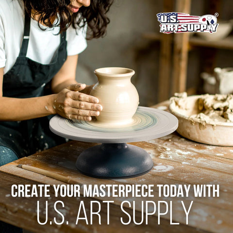 Front view of a beige clay vase on a large 12-inch sculpting wheel with metal turntable and base, US Art Supply.