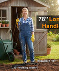 Person holding Heavy Duty Lawn Leveling Rake With Four Spiked Wheels And Smooth Roller For Multi Surface Grading