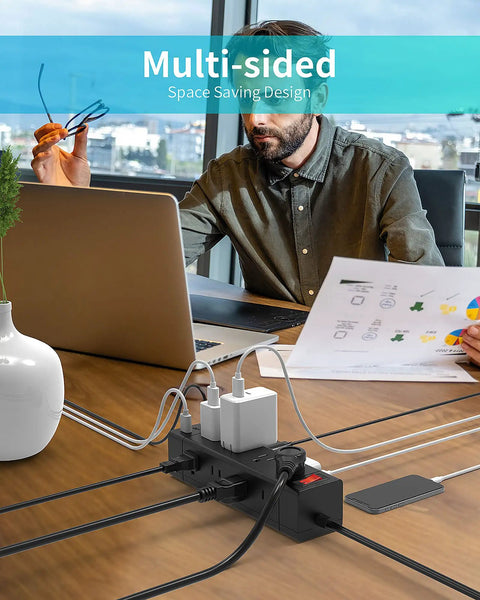 Flat 5 Ft Power Strip With USB C And 3 USB Ports 12 Outlets Surge Protector for home office use on a desk with laptop and papers