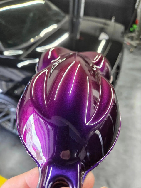 Close-up of Wineberry Basecoat Auto Paint Gallon Paired With Medium Reducer Creates A Dope Candy Pearl Colorshift showing vibrant purple finish.