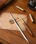 Vintage Sword Style Letter Opener for Envelopes and Mail with Slick Precision Slitter on wooden desk