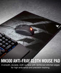 Anti Fray Cloth Gaming Mouse Pad For Pixel Precision Extended Size With Stitched Edges For Durability Anti Slip Grip Pro Grade For Laser And Optical Mice High Performance Control Multi Color shown with keyboard and mouse.