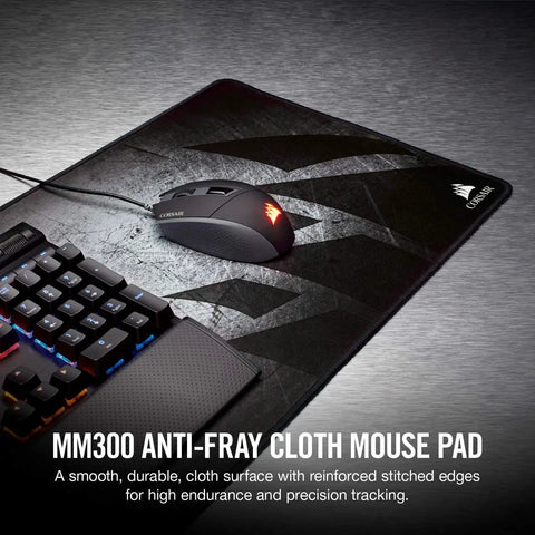 Anti Fray Cloth Gaming Mouse Pad For Pixel Precision Extended Size With Stitched Edges For Durability Anti Slip Grip Pro Grade For Laser And Optical Mice High Performance Control Multi Color shown with keyboard and mouse.