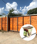 2 Pcs U Groove Pulley Wheel Casters 1 Inch Groove U Type for sliding gates with wooden gate installation and clear sky.